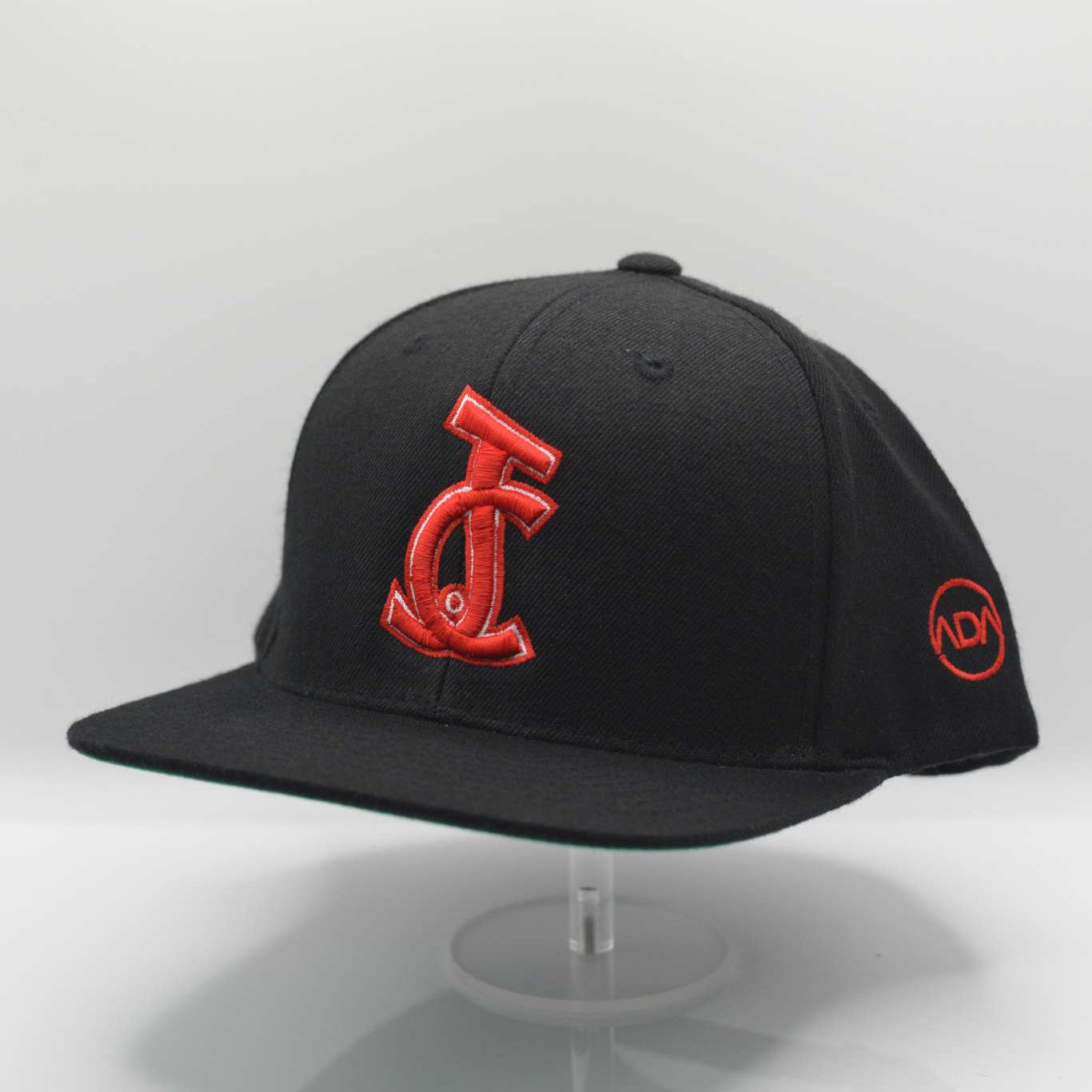 The JC Snapback in black, red, and green delivers bold faith and streetwear style. Wear your belief with power. Designed by Aaron David Apparel.