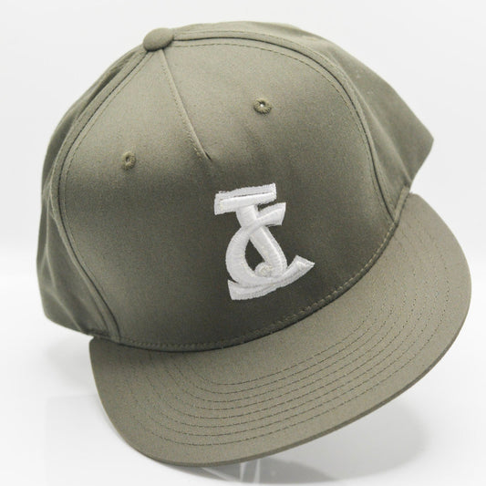 Rooted in truth. The JC Snapback in olive and white brings faith to fashion with clean lines, Christ-centered design, and an outdoor-ready style by ADA.
