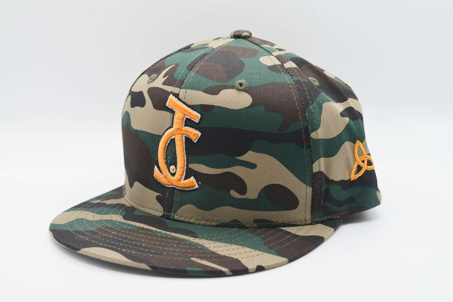 Camo snapback hat with bright orange JC monogram embroidery on the front and an orange trinity knot symbol on the side, by Aaron David Apparel