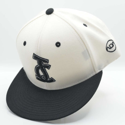 The JC Monochrome Snapback is bold and clean. Bone crown, black brim, and JC logo. A sleek, faith-rooted essential from Aaron David Apparel.

