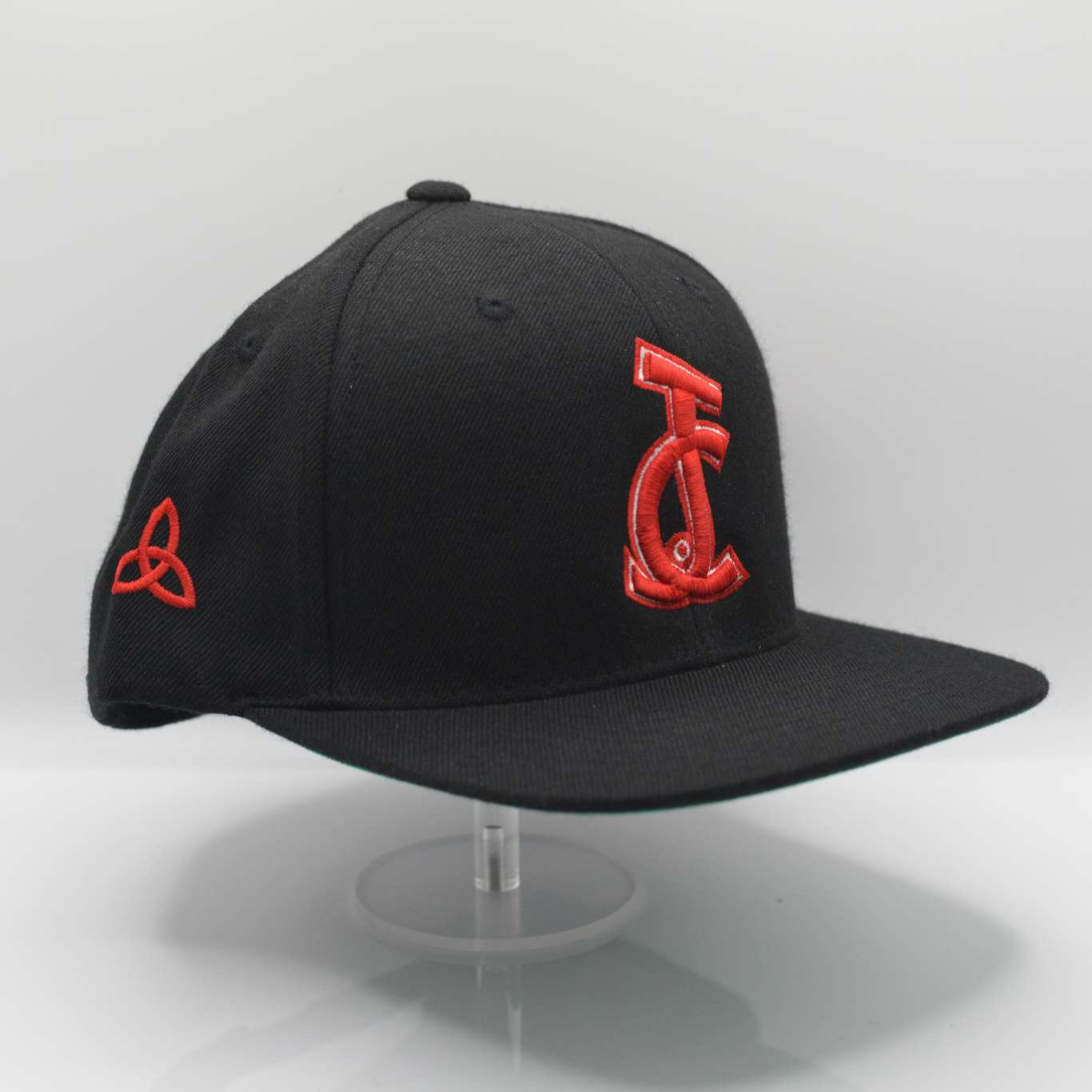 The JC Snapback in black, red, and green delivers bold faith and streetwear style. Wear your belief with power. Designed by Aaron David Apparel.

