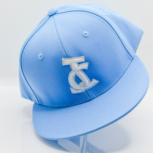 Clean and bold. This powder blue JC Snapback features white embroidery and faith-centered style from Aaron David Apparel. Wear grace. Live bold.
